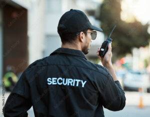 Security officer communicating via radio while providing Los Feliz patrol security in Los Angeles.