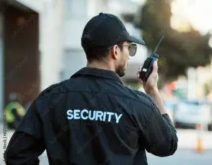 Security officer communicating via radio while providing Studio City patrol security in Los Angeles.