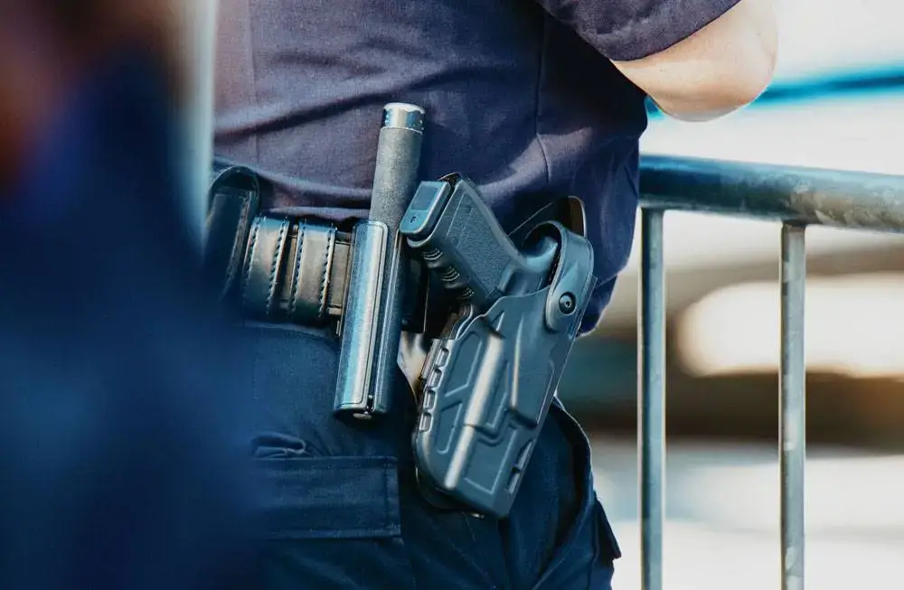 Armed security guard in Los Angeles providing professional protection with a holstered firearm — Safety Host Unit PPO-120547